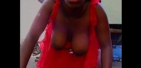  Black MILF in red dress Choclate Tie eats dick before getting fucked from behind